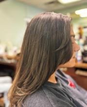 medium long hair cut blunt one length with face framing layers and curtain bangs trendy tiktok long layered haircut hair cut affordable hair services near me appointments available and walk ins at the best hair school in brantford for hairstyling barbering aesthetics college diploma hairstylist hairdresser hair salon 