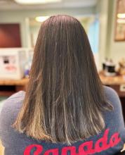 medium long hair cut blunt one length with face framing layers and curtain bangs trendy tiktok long layered haircut hair cut affordable hair services near me appointments available and walk ins at the best hair school in brantford for hairstyling barbering aesthetics college diploma hairstylist hairdresser hair salon