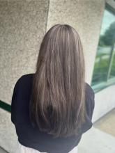 dark brown brunette long hair with icy platinum blonde highlights women's hair ideas 2024 affordable salon hair services near me in brantford ontario top rated best hairstyling school in town for hairstylist diploma 