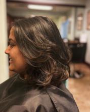 womens short hair medium length hair cut haircut idea 2023 trendy cut thick full voluminous curly hair with layers and movement 90s hair volume gorgeous hairstyle affordable hair services cuts and blowout near me in brantford ontario from top rated hair school hairstylist hairdresser hair school in brantford offering hair styling college diploma program