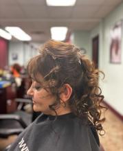 hair trends 2023 curly ponytail updo volume thick long hair beautiful hairstyle for formal event