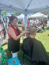 Brantford Canada Day Celebration at Lion's Park giving hair cuts and buzz cuts