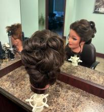 bridal bride wedding elegant voluminous long hair updo beautiful sleek soft bun hairstyle inspiration brantford ontario hair beauty cosmetology school college diploma hairstyling barbering near me
