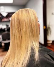 warm golden tone blonde hair root retouch highlights foils long hair balayage partial highlight full highlight hairstylist hairdresser hair stylist dresser near me in brantford ontario affordable hair services colour and cut best top rate hair school in brantford with hairstyling and barbering college diploma program